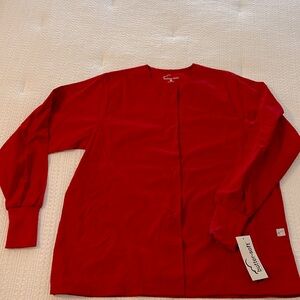 Scrub jacket with snap button closure, round neck, rib knit cuff, 2 front pocket